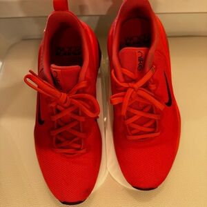 Nike Orange Bella Trainer 7 with Black Swoosh size 8 worn twice